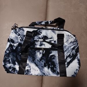 Unbranded brand new blue/black/,white duffel traveling bag  good for travel